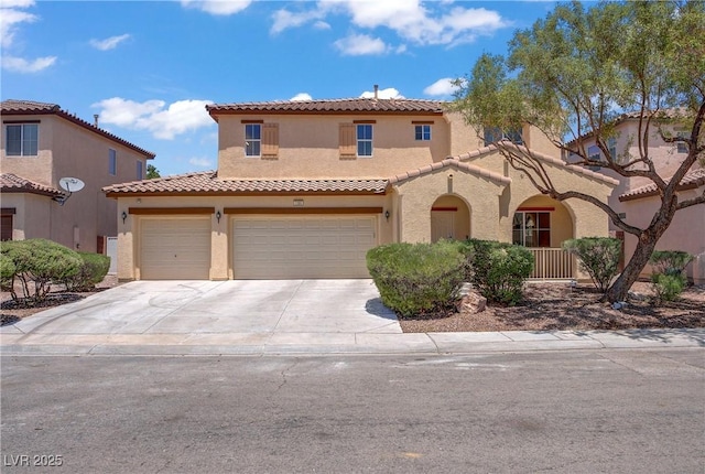 1208 Silver Bark Ave, North Las Vegas, NV 89081 - mediterranean / spanish-style house with stucco siding, a tile roof, driveway, and an attached garage