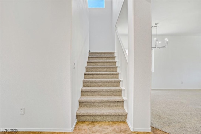 1208 Silver Bark Ave, North Las Vegas, NV 89081 - staircase featuring a chandelier and tile patterned floors