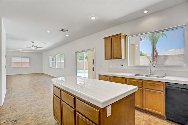 1208 Silver Bark Ave, North Las Vegas, NV 89081 - kitchen featuring dishwasher, tile countertops, healthy amount of natural light, and recessed lighting