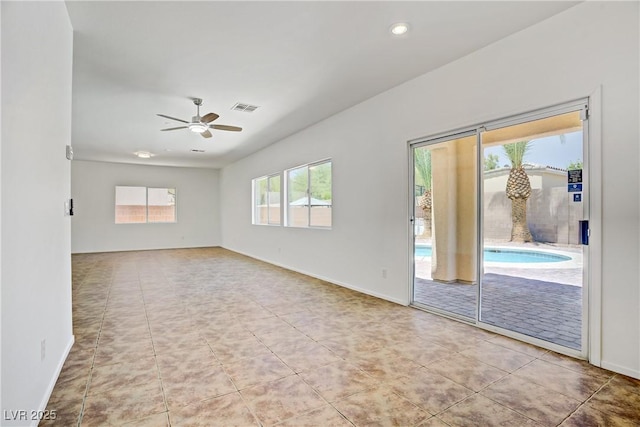 1208 Silver Bark Ave, North Las Vegas, NV 89081 - spare room with ceiling fan, tile patterned floors, and recessed lighting