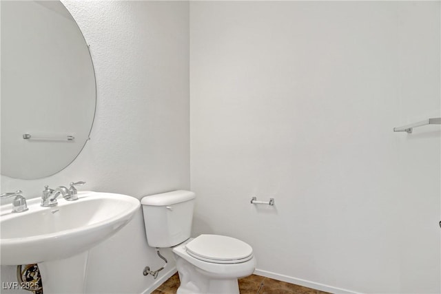 1208 Silver Bark Ave, North Las Vegas, NV 89081 - bathroom with toilet and tile patterned flooring