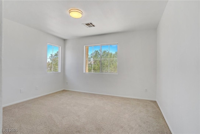 1208 Silver Bark Ave, North Las Vegas, NV 89081 - empty room with light carpet and baseboards