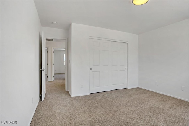 1208 Silver Bark Ave, North Las Vegas, NV 89081 - unfurnished bedroom featuring carpet flooring and a closet