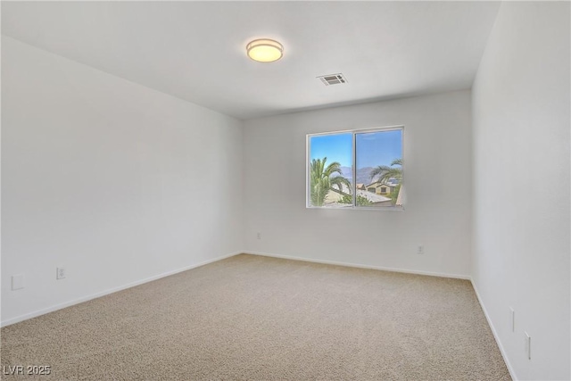 1208 Silver Bark Ave, North Las Vegas, NV 89081 - empty room featuring light carpet and baseboards