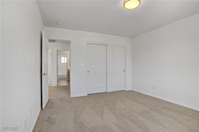 1208 Silver Bark Ave, North Las Vegas, NV 89081 - unfurnished bedroom featuring carpet floors and a closet