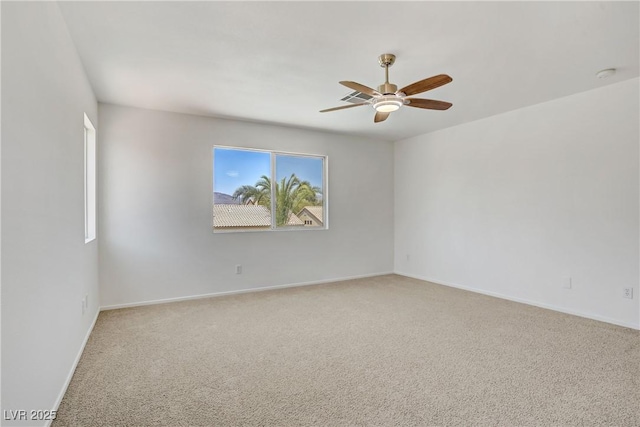 1208 Silver Bark Ave, North Las Vegas, NV 89081 - empty room with a ceiling fan and light colored carpet
