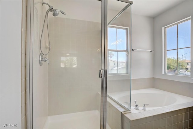 1208 Silver Bark Ave, North Las Vegas, NV 89081 - full bath with a stall shower, a garden tub, and healthy amount of natural light