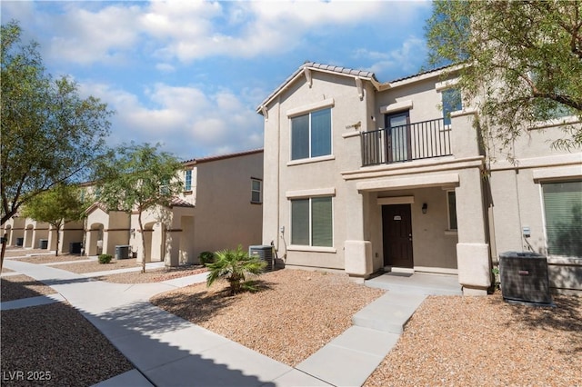 4588 Dover Straight St, Las Vegas, NV 89115 - mediterranean / spanish-style house featuring a balcony, stucco siding, and a tile roof