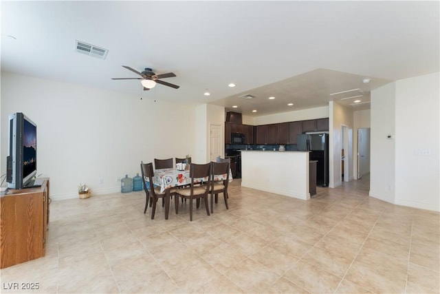 4588 Dover Straight St, Las Vegas, NV 89115 - dining room with recessed lighting, ceiling fan, and light tile patterned floors
