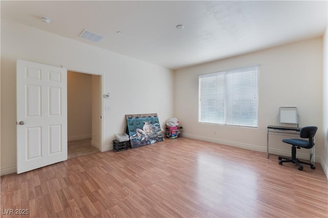 4588 Dover Straight St, Las Vegas, NV 89115 - unfurnished office featuring light wood-type flooring and baseboards