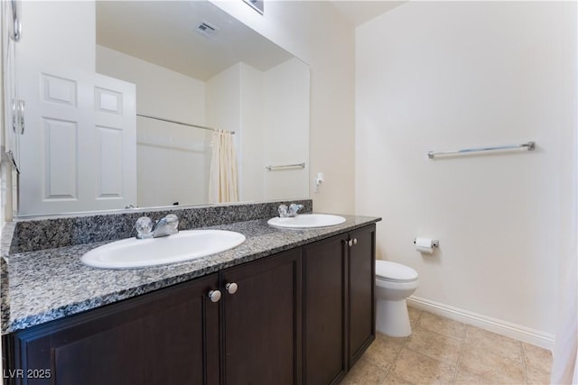 4588 Dover Straight St, Las Vegas, NV 89115 - full bath featuring double vanity, a shower with curtain, and tile patterned floors