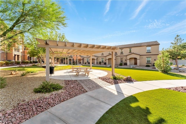4588 Dover Straight St, Las Vegas, NV 89115 - view of home's community featuring a pergola and a lawn