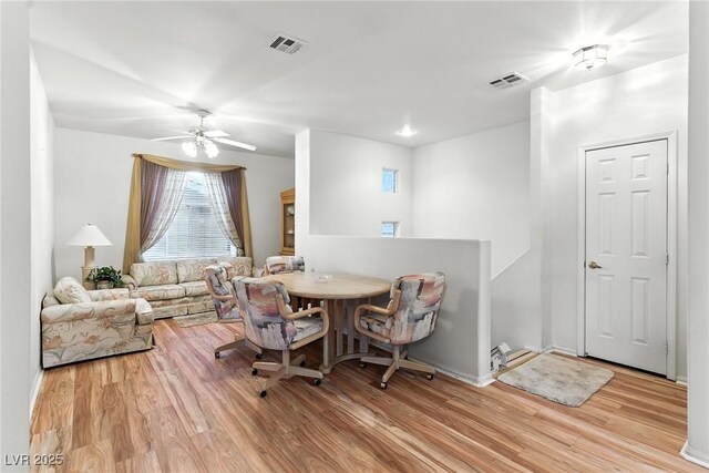 1713 Sky Of Red Dr Unit 201, Las Vegas, NV 89128 - dining space featuring wood finished floors and a ceiling fan