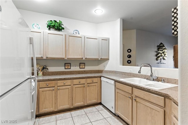 1713 Sky Of Red Dr Unit 201, Las Vegas, NV 89128 - kitchen with white appliances, light tile patterned floors, light brown cabinetry, and light countertops