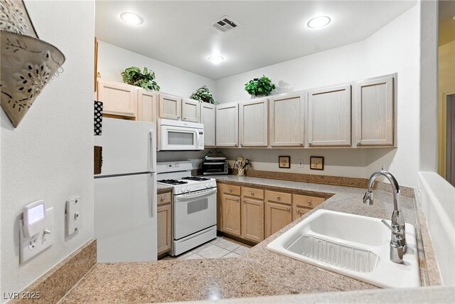 1713 Sky Of Red Dr Unit 201, Las Vegas, NV 89128 - kitchen with white appliances, light brown cabinetry, light tile patterned flooring, light countertops, and recessed lighting