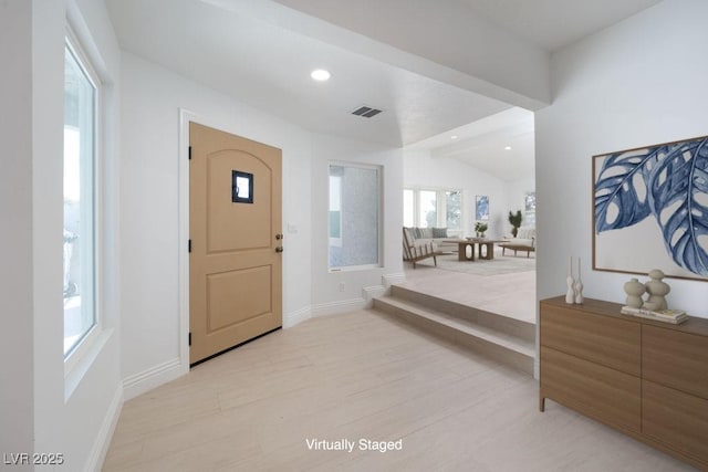 714 Lacy Ln, Las Vegas, NV 89107 - foyer with light wood finished floors, recessed lighting, and lofted ceiling