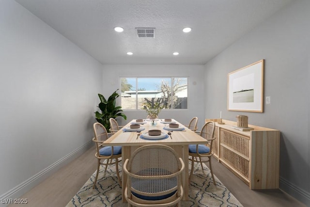 714 Lacy Ln, Las Vegas, NV 89107 - dining room featuring recessed lighting and a textured ceiling