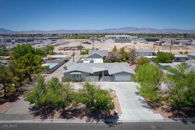 714 Lacy Ln, Las Vegas, NV 89107 - aerial perspective of suburban area with a mountainous background