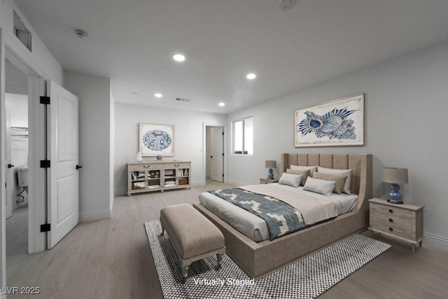 714 Lacy Ln, Las Vegas, NV 89107 - bedroom featuring light wood-style floors and recessed lighting