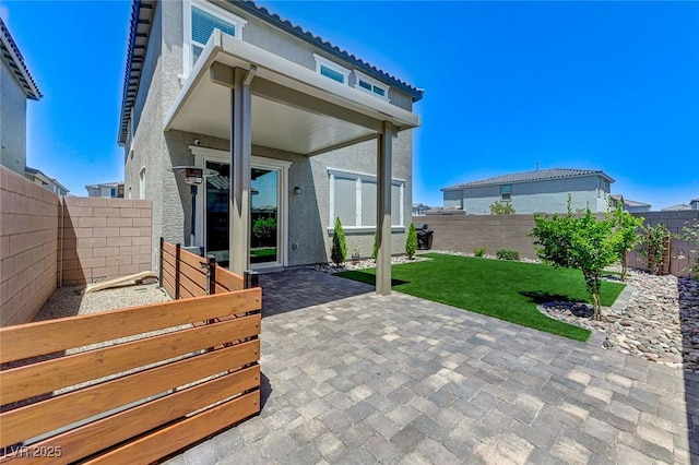 4133 Golden Fleece Ave, Las Vegas, NV 89141 - fenced backyard with a patio