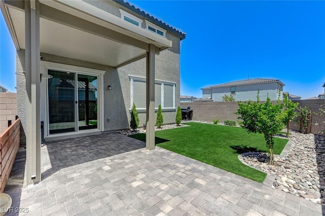 4133 Golden Fleece Ave, Las Vegas, NV 89141 - fenced backyard with a patio