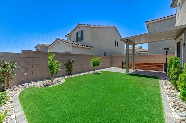 4133 Golden Fleece Ave, Las Vegas, NV 89141 - fenced backyard featuring a patio area