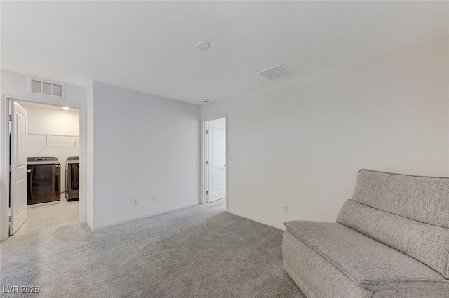 4133 Golden Fleece Ave, Las Vegas, NV 89141 - sitting room with independent washer and dryer and light colored carpet