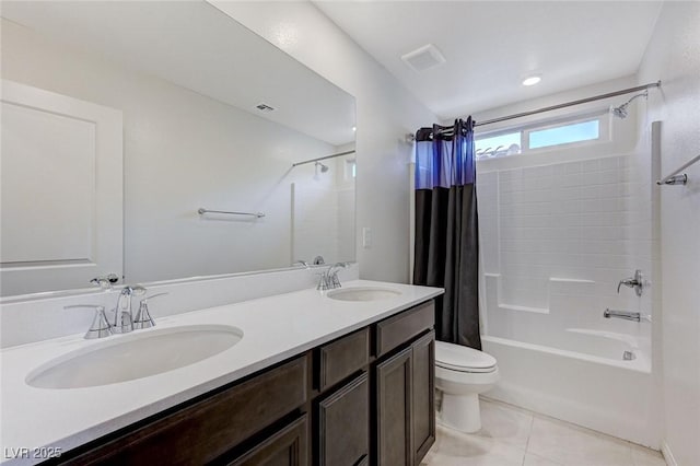 4133 Golden Fleece Ave, Las Vegas, NV 89141 - full bath featuring shower / bath combo with shower curtain, double vanity, and tile patterned flooring