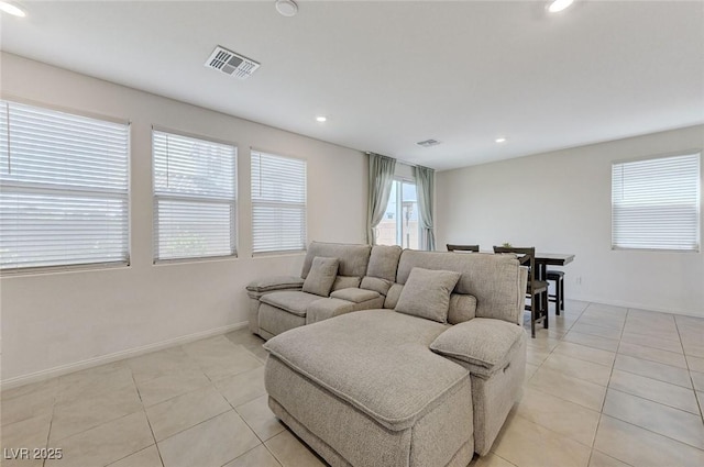 4133 Golden Fleece Ave, Las Vegas, NV 89141 - living room with light tile patterned flooring and recessed lighting