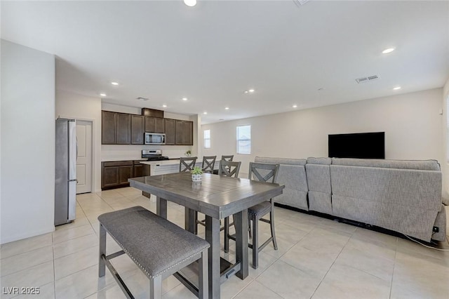 4133 Golden Fleece Ave, Las Vegas, NV 89141 - dining area with light tile patterned floors and recessed lighting