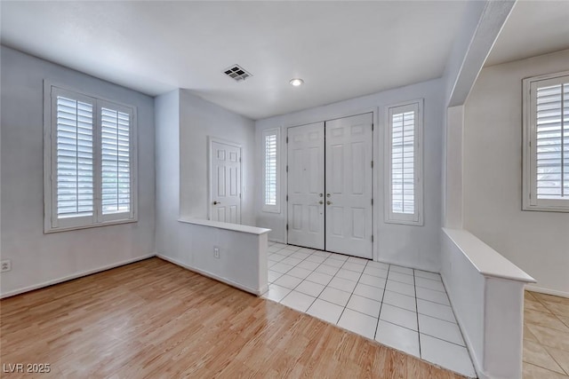 208 Glendon St, Henderson, NV 89074 - foyer entrance with healthy amount of natural light and light wood-type flooring