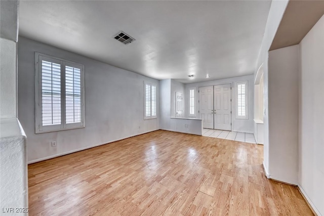 208 Glendon St, Henderson, NV 89074 - unfurnished living room featuring wood finished floors and plenty of natural light