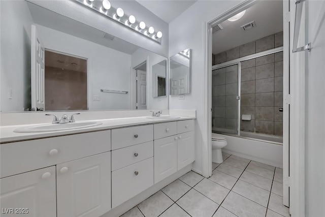 208 Glendon St, Henderson, NV 89074 - full bathroom featuring double vanity, tile patterned flooring, and combined bath / shower with glass door