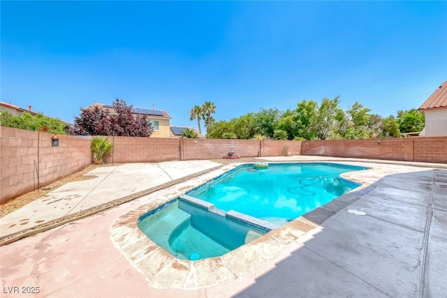 208 Glendon St, Henderson, NV 89074 - view of pool with a pool with connected hot tub, a patio area, and a fenced backyard