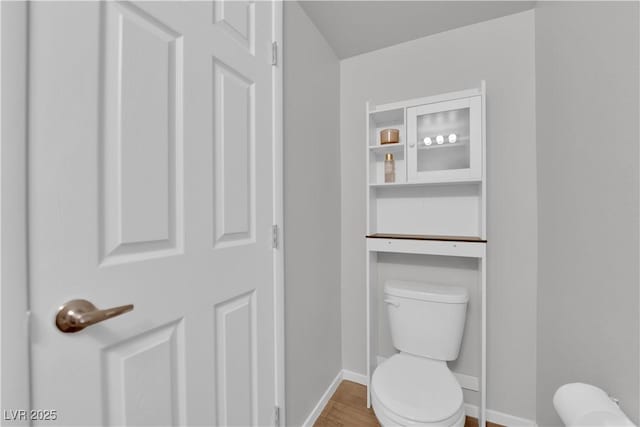 4650 Blaise Ave Unit 102, North Las Vegas, NV 89084 - bathroom with toilet and wood finished floors
