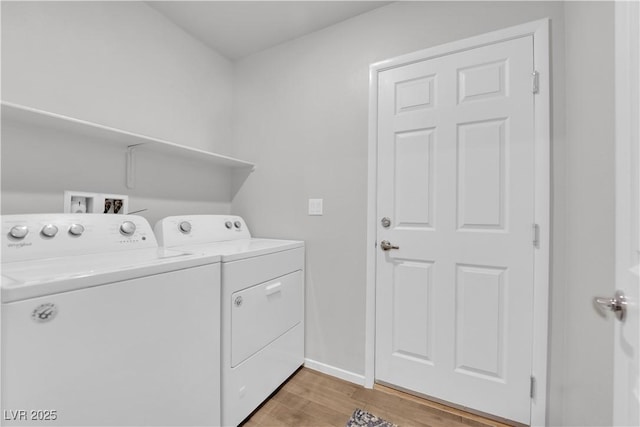 4650 Blaise Ave Unit 102, North Las Vegas, NV 89084 - laundry area featuring washer and clothes dryer and light wood finished floors