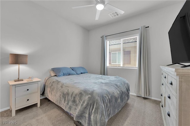 4650 Blaise Ave Unit 102, North Las Vegas, NV 89084 - bedroom featuring light colored carpet and ceiling fan
