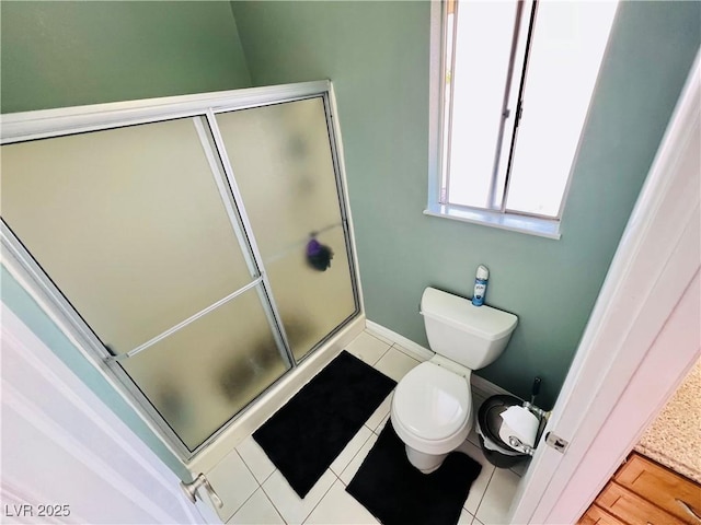 421 Courtney Ln, Las Vegas, NV 89107 - bathroom featuring a stall shower and tile patterned floors