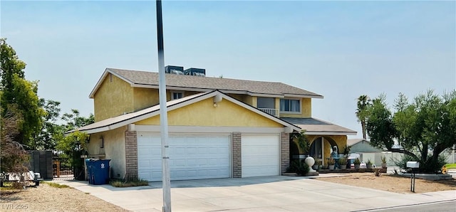 421 Courtney Ln, Las Vegas, NV 89107 - traditional-style house featuring driveway, stucco siding, and an attached garage