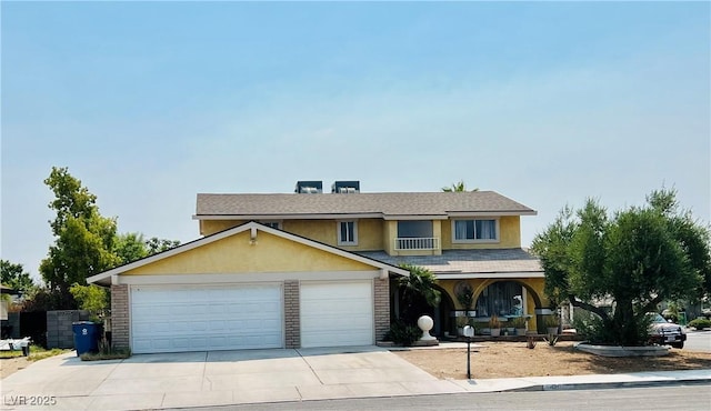 421 Courtney Ln, Las Vegas, NV 89107 - traditional-style home featuring driveway, an attached garage, stucco siding, and a porch