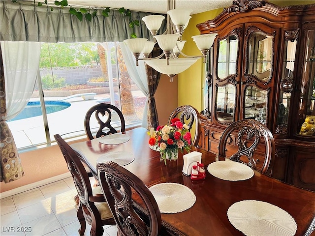421 Courtney Ln, Las Vegas, NV 89107 - dining space featuring plenty of natural light and tile patterned floors