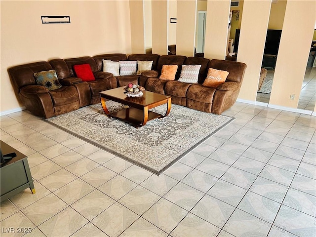 421 Courtney Ln, Las Vegas, NV 89107 - living room with light tile patterned floors and baseboards