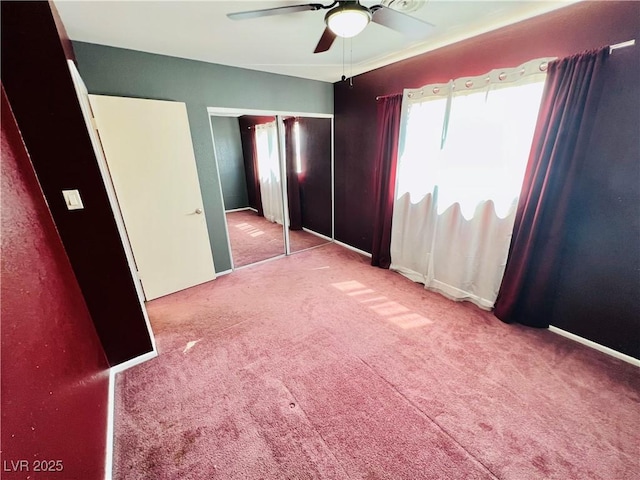 421 Courtney Ln, Las Vegas, NV 89107 - unfurnished bedroom featuring carpet floors, ceiling fan, and a closet