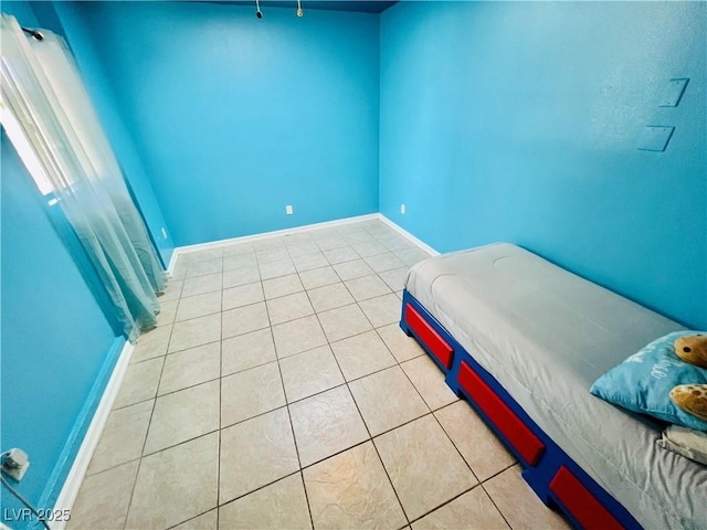 421 Courtney Ln, Las Vegas, NV 89107 - bedroom featuring tile patterned flooring