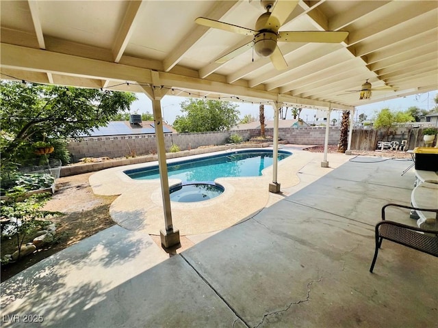 421 Courtney Ln, Las Vegas, NV 89107 - view of pool featuring ceiling fan, a fenced backyard, a patio, and a pool with connected hot tub