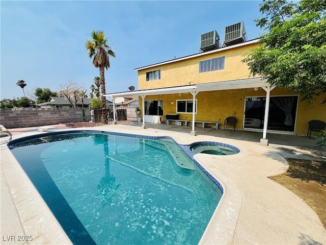 421 Courtney Ln, Las Vegas, NV 89107 - view of swimming pool featuring a patio and a pool with connected hot tub