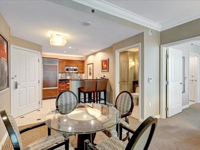 125 E Harmon Ave Unit 220, Las Vegas, NV 89109 - dining space featuring ornamental molding and light colored carpet