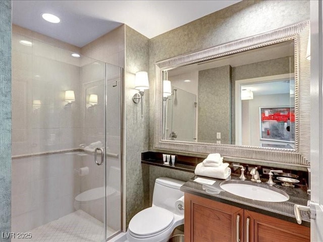 125 E Harmon Ave Unit 220, Las Vegas, NV 89109 - full bathroom featuring a stall shower and vanity