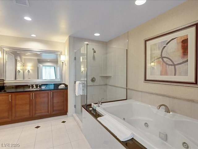 125 E Harmon Ave Unit 220, Las Vegas, NV 89109 - full bath featuring a shower stall, a tub with jets, vanity, tile patterned flooring, and recessed lighting