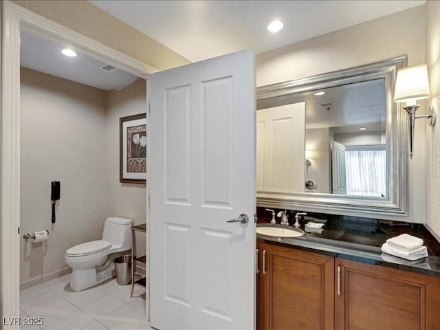 125 E Harmon Ave Unit 220, Las Vegas, NV 89109 - bathroom featuring vanity and tile patterned flooring